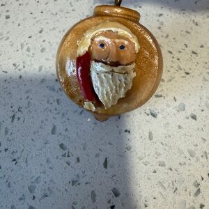 Handcrafted Wooden Santa Ornament in Brown and Red